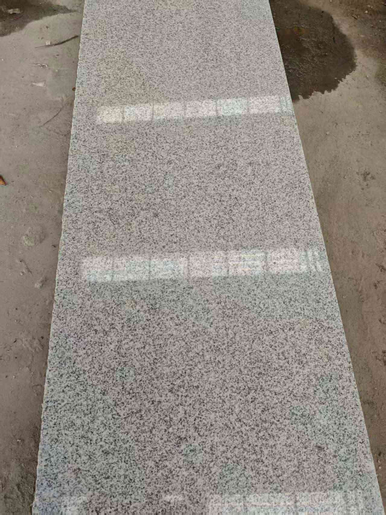 金昌芝麻白光面毛板